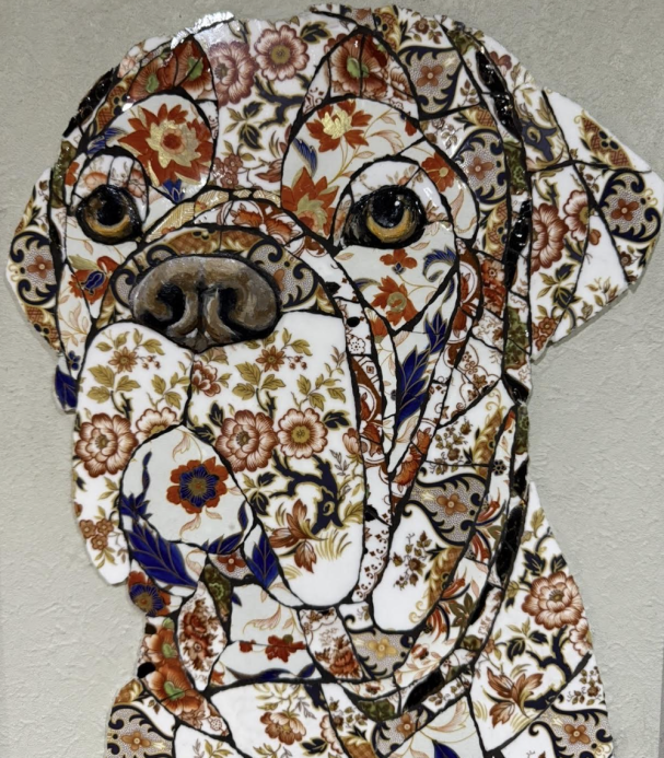 Handmade mosaic portrait of a Dogue de Bordeaux created from individually hand‑cut vintage china plates in dark and neutral tones.”